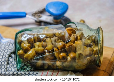 Broken Glass Jar. Mushrooms Home Canning. Safety At Home.