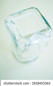 Broken Glass Jar On A Light Background