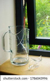 Broken Glass Jar On Window Ledge