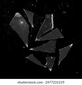 broken glass on a black background. shards of glass. pieces of glass