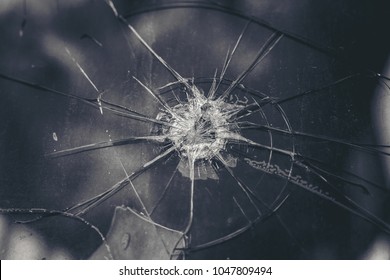 Broken glass on dark background, cracked glass effect for design element