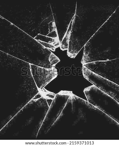 Broken glass on a gray background, isolated