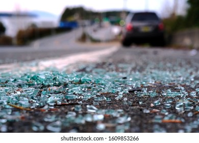 Broken Glass, Parked Car, Winding Road