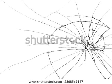 Broken glass as spider web or as bullet hole in the door photography, black and white isolated background