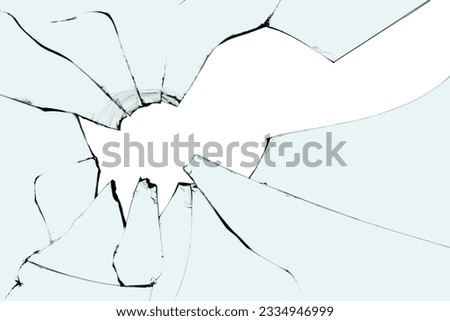 Broken glass texture crack with a hole in the center of the window on a white background