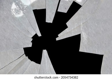 broken glass texture in shattered window on black background