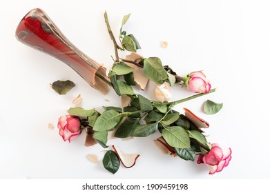 Broken Glass Vase. Broken Vase Of Flowers. Broken Vase Of Roses On The Floor.