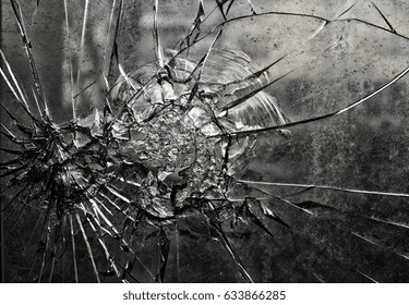 Broken glass window in abandoned house, disaster and vandalism
