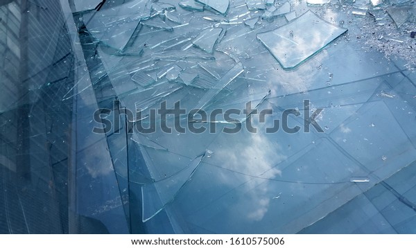 Broken glass window.\
Abstract vintage background. Crack on glass. Broken glass for\
background pattern