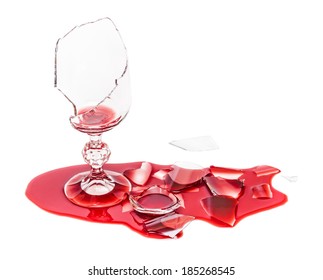 Broken glass of wine. Poured red wine, like blood. Isolated on white background. Studio shoot.