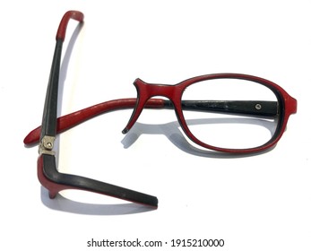 Broken Glasses In Black And Red Combination That Were Broken From Being Stepped On