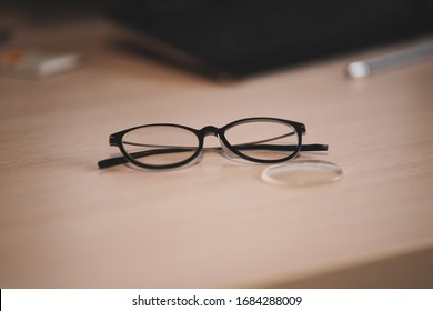 Broken Glasses On Table .