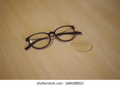 Broken Glasses On Table .