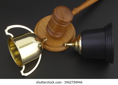 Broken Golden Trophy Cup And Judge Gavel, Cancellation Competition Concept.