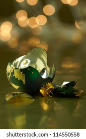 Broken Green and Gold Holiday ornament