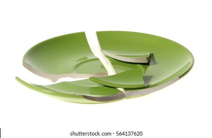 Broken Green Plate On White Background
