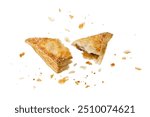 Broken in half fresh baked broken in half  pastry puff pie apple turnover with crumbs isolated on white background. Pastry card.