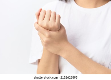 Broken Hand Cramp. Closeup Shot Of Suffering Beautiful Young Asian Woman Touch Massage Painful Hand Wrist Posing Isolated On White Background. Injuries Poor Health Illness Concept. Cool Offer Banner