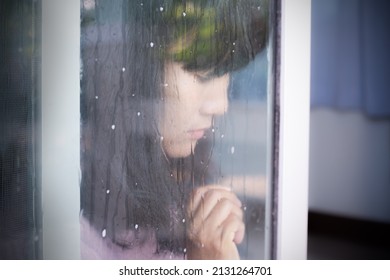 Broken Heart Concept. Drop Water On Glass Door With Blur Alone Woman Sad And Cry Closc Up. For Card Or Poster Couple Problem, Love Valentine Day, Disappointment. Authentic Black Hair Asian Thailand.