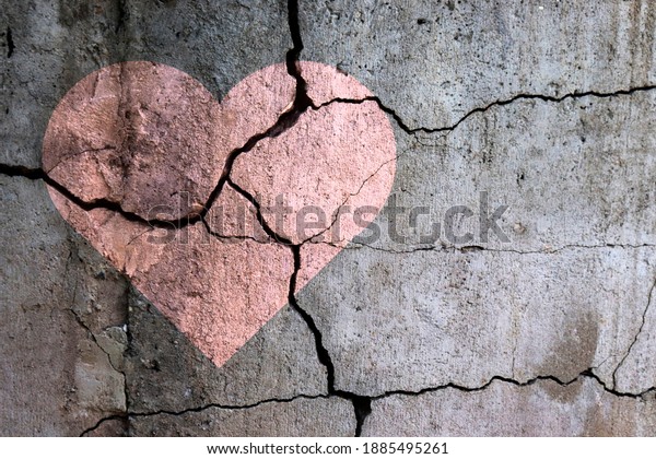 A broken heart. Drawing of a heart on a cracked\
wall. Broken relationships. Treason and betrayal. Past love. A\
quarrel.