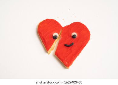 Broken Heart Shaped Cookie On White Background