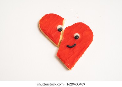 Broken Heart Shaped Cookie On White Background