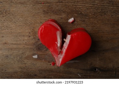 Broken Heart Shaped Soap Bar On Wooden Background, Top View. Relationship Problems Concept