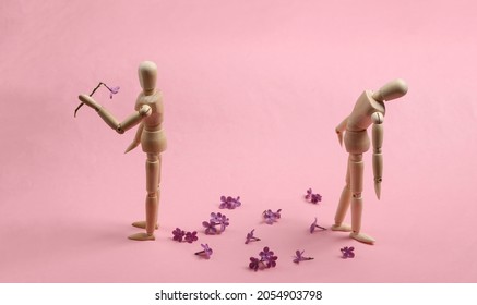 Broken heart. Two puppets on a pink background. Parting, attitude - Powered by Shutterstock