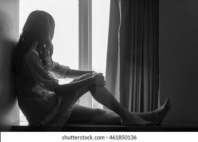 Broken Heart Woman Is Crying Alone In The Window,silhouette,Valentines Day Concept.