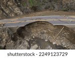 Broken Highway road damaged Destroyed Flooded River, Ojai, California, Ventura River disaster Rain Storm