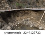 Broken Highway road damaged Destroyed Flooded River, Ojai, California, Ventura River disaster Rain Storm