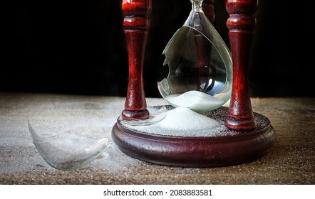          Broken hourglass - sand clock                      