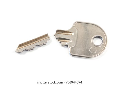 Broken House Key Isolated On White Background
