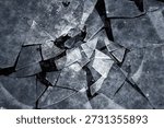 Broken ice shards on ground in winter