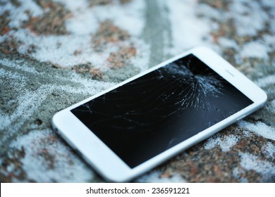 Broken iPhone outdoors