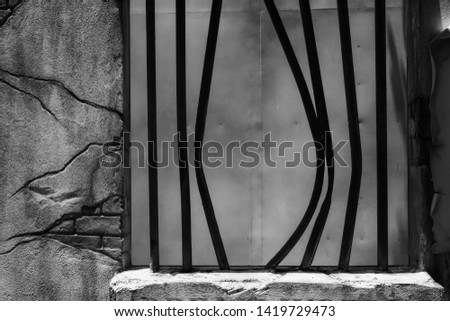 Broken Jail Bars in Prison Window. Black and white color process with copy space for text. Jailbreak or