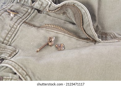 Broken Jean Pants Zipper Pull Waiting To Be Repaired