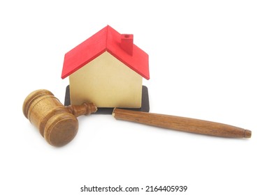 Broken Judge Gavel And Wooden House  Isolated On White Background.