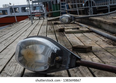 Broken Lamp In An Old Boat Marina