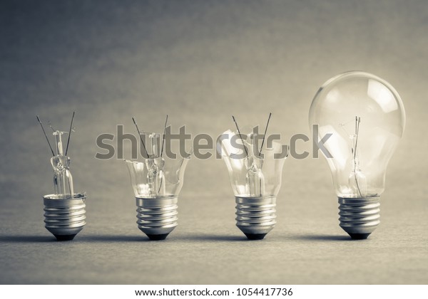 Broken light bulb step to the perfect one, failure\
to success, improvement\
idea