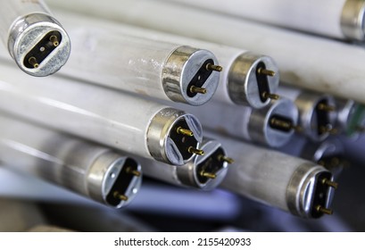 Broken light fluorescents in recycling company, environment - Shutterstock ID 2155420933