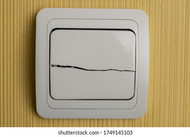 Broken Light Switch On A Room Wall