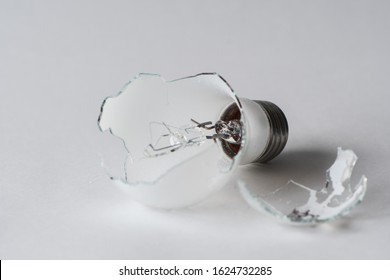 Broken Lightbulb Isolated On White Background