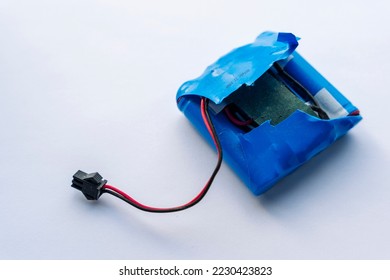  broken lithium battery pack with wires and a terminal