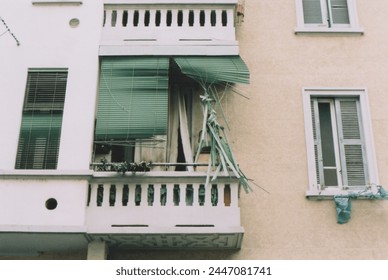 Broken Metal Curtain of an Abandoned House in Milano, Italy. Film Photography - Powered by Shutterstock