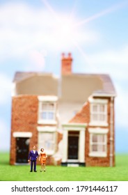 Broken Minature House Figure With People Outside