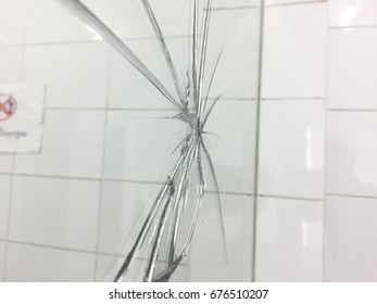 Broken Mirror Glass.