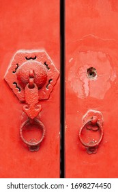Broken or Missing door knock handle on a Chinese design vintage door