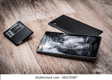 Broken mobile phone and parts