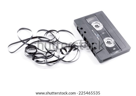 broken music cassette with tape jam